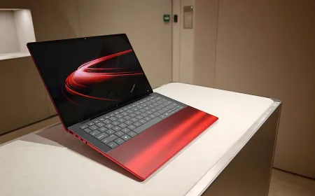 The HP and Ferrari laptop features a red finish and a transparent panel that reveals the internal hardware.