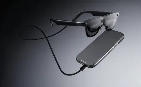 XREAL Aura XR glasses with Snapdragon Reality Elite chipset, featuring an optical see-through display and 3D hand tracking.