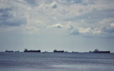 Satellite imagery shows minimal vessel movement through the Strait of Hormuz despite diplomatic agreements.