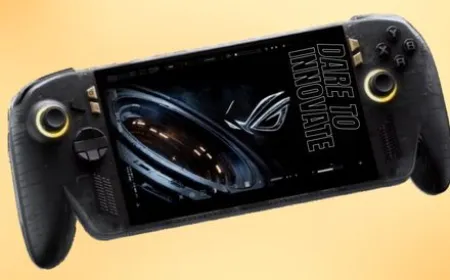 A translucent black handheld console shows visible golden structural elements and an OLED screen alongside AR glasses.