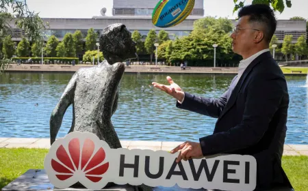 Huawei representatives showcasing renewable energy technology at a UCD pit stop.