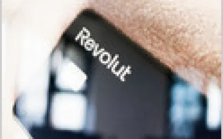 Revolut corporate branding and financial charts representing its $115 billion secondary share sale.