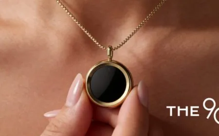 The90 Gem UV tracking pendant rests on a necklace chain to monitor daily sun exposure.