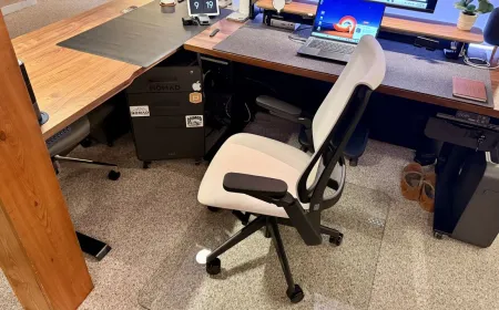 The Ergonofis Equation chair displays a woven textile seat and a weight-activated tilt mechanism.