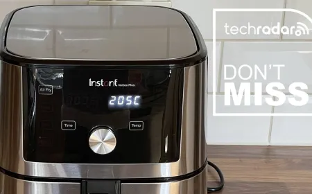 A six quart convection air fryer sits on a kitchen counter with its wire basket visible.