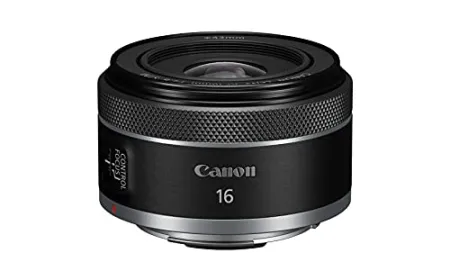A collection of interchangeable camera lenses rests on a neutral surface for beginner creators.