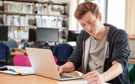 University students use laptops and tablets to access artificial intelligence tools for academic productivity.