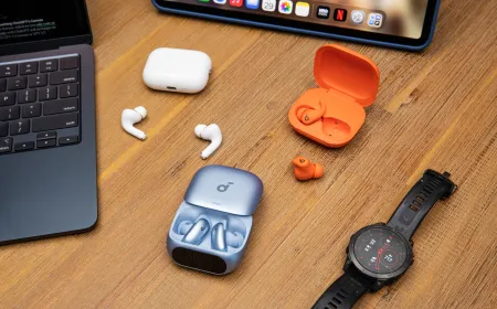 The image displays Soundcore Liberty 5 Pro, AirPods Pro 3, and Beats Powerbeats Fit wireless earbuds arranged side by side.