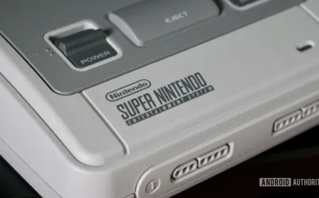 Delta emulator on iPhone with SN Operator hardware adapter connected to a physical Super Nintendo cartridge.