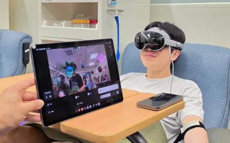 A person wears a Samsung Galaxy XR headset during a blood donation session.