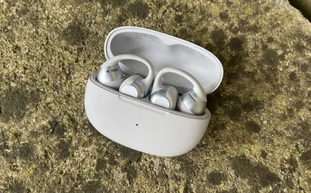 Shokz OpenDots 2 open-ear headphones featuring a clip-on design, dual drivers, and multipoint connectivity.