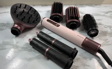 The Dreame AirStyle Era hair styling device is displayed alongside its eight interchangeable attachments.