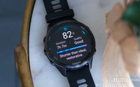 The Garmin Forerunner 970 smartwatch shows its titanium and sapphire build, multi-band GPS, and integrated LED flashlight.