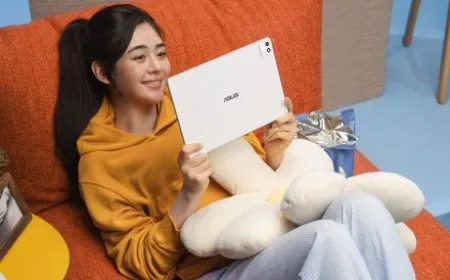 The Asus Pad tablet features a prominent OLED display and a refined aluminum chassis.