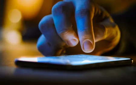 A laptop screen shows a chat interface next to legal documents highlighting artificial intelligence safety concerns.
