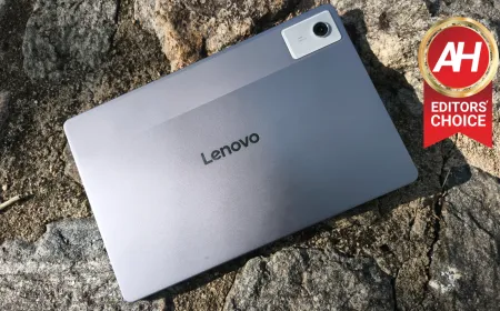The Lenovo Idea Tab Plus tablet rests on a desk with a digital textbook open on its screen.