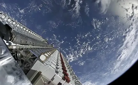 Lithuanian technicians assembling small satellite hardware for commercial space applications.