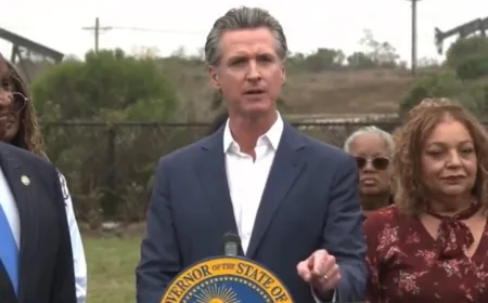 California Governor Gavin Newsom addresses reporters at a press conference