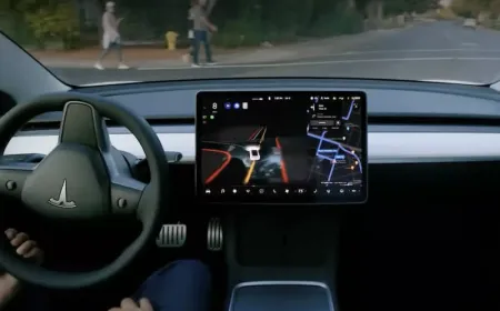 Employees reviewing Tesla driving footage in a data labeling office to train full self driving systems.