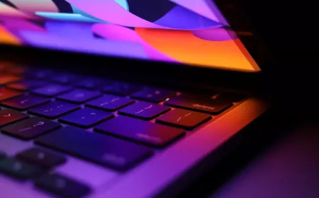 A lineup of modern laptops representing the top Mac, Windows, and Nvidia models of 2026