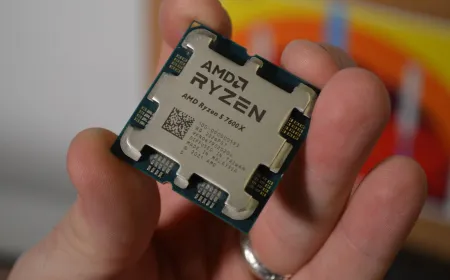AMD Ryzen 7 7700X3D processor sits next to an AM5 motherboard socket.
