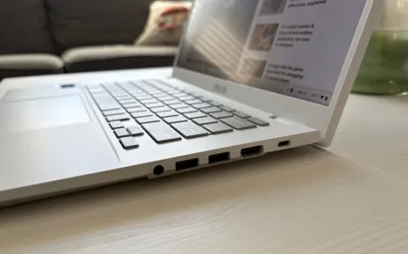 Three Chromebooks are arranged side by side for comparison, featuring the Asus CX34, CX15, and Lenovo Plus 14 models.