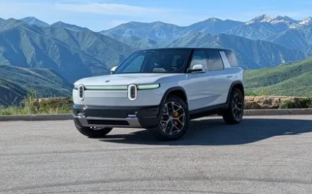 Rivian R2 two-row electric SUV displaying its boxy design and rugged profile.