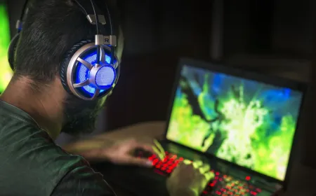 Promotional material contrasts Windows gaming compatibility with the MacBook Neo productivity focus.