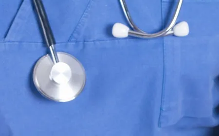A diagram illustrates a ransomware attack targeting NHS medical records.
