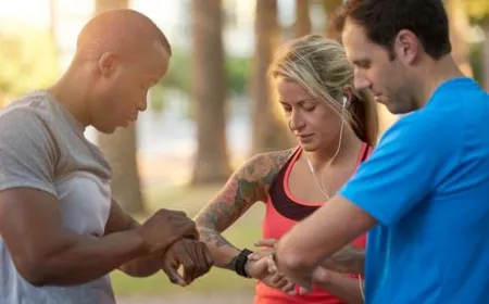 A smartwatch displays health metrics beside a clinical record.