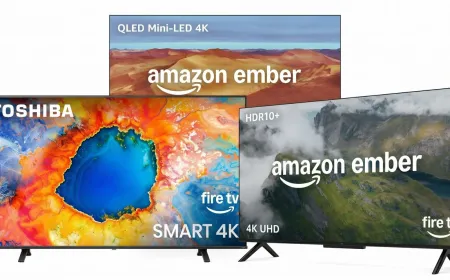 Multiple television models are displayed with promotional price tags for early Prime Day sales.