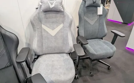 A Formula V Line Solen gaming chair with motorized recline, retractable footrest, and massage system sits at Computex 2026.