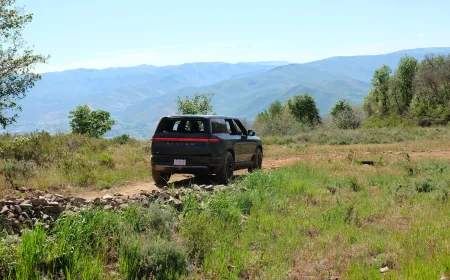 The Rivian R2 electric SUV features a dual-motor powertrain and a rugged exterior designed for off-road capability.