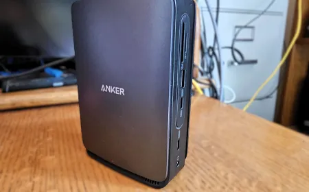 The Anker two-part docking station is shown in desktop and compact travel configurations.