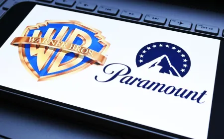Logos of Paramount Skydance and Warner Bros Discovery displayed together to mark the approved merger