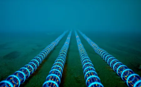 The illustration shows acoustic monitoring sensors deployed along undersea cables to detect seabed vibrations.