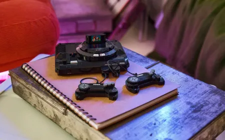 Lego brick model of the Sega Genesis console with detachable controllers and a Sonic cartridge.