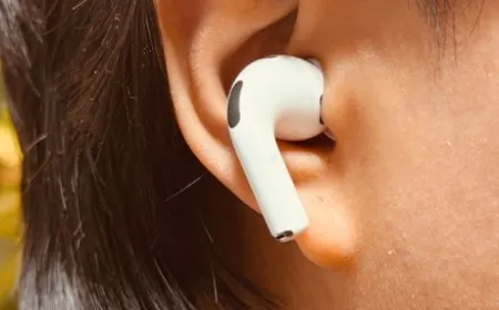 Apple AirPods feature integrated camera sensors for spatial computing and environmental recognition.