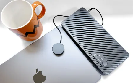 The AV Access iDock M10 KVM dock connects a laptop and desktop to dual monitors.