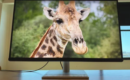 BenQ MA320UG 32-inch 4K monitor with glossy nano coating and adjustable stand.