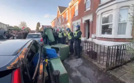 Protesters throw objects at police officers during a Southampton demonstration over a student murder conviction.