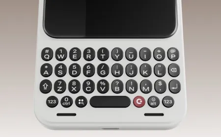 Detailed view of the Clicks Communicator input mechanism emphasizing ergonomic design and tactile feedback.