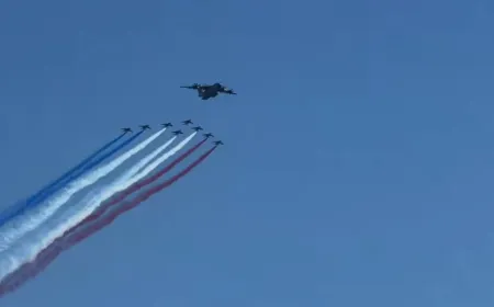 French Air Force acrobats fly over the Statue of Liberty during the Liberty 250 commemorative campaign.