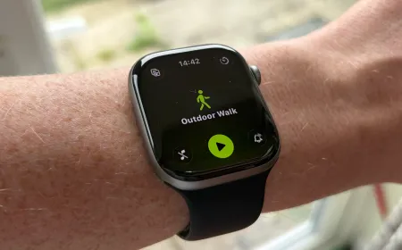 The Apple Watch Series 11 displays health metrics, battery status, and current pricing information.