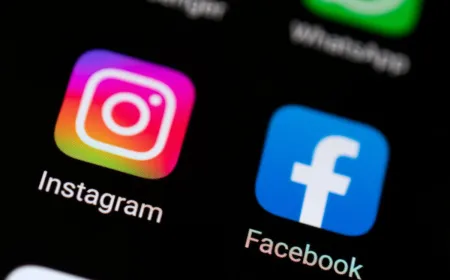 A computer monitor displays a security alert regarding compromised Instagram accounts and Meta AI vulnerabilities.