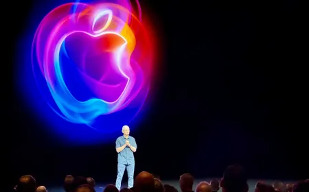 Apple logo displayed on a large screen during a WWDC keynote presentation.