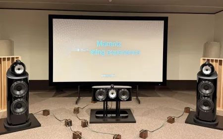 A reference listening room features a 9.4.6 speaker array and acoustic treatment for spatial audio testing.