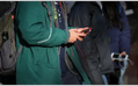 Teenagers using smartphones and social media applications