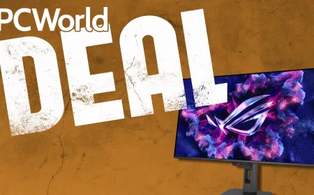 Thirty-two inch QD-OLED gaming monitor displaying a desktop interface with 4K resolution and a 165Hz refresh rate.