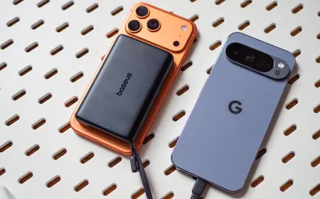 The Baseus AM52 power bank features a compact body, integrated cable, and magnetic Qi2 connector.